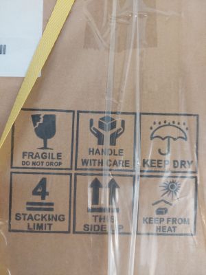 a brown box with a yellow ribbon on top of it