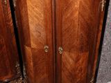 pair of antique french style armoires in walnut veneered wood