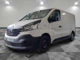 the white van is parked on a checkered floor in a room