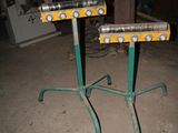 two tables that have lights on them in a room