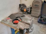 a workbench with tools on it in a room