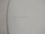 a close up of a toilet seat with the lid down