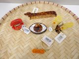 a tray with a lot of hair accessories on it