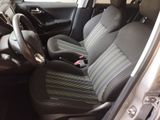 the interior of a car with two seats and a steering wheel