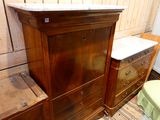 a dresser with a marble top in a room