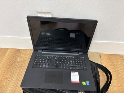 a laptop that is sitting on top of a box
