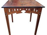 une image représentant une table en bois avec un plateau noir sur fond blanc