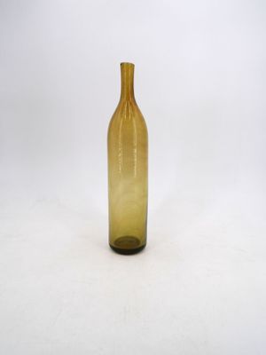 an image of a yellow glass bottle on a white background