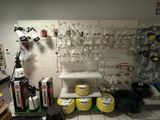 a picture of a room with a lot of tools on the wall