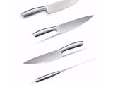 four different types of knives are shown on a white surface