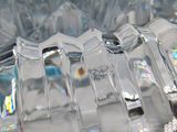a close up of a glass object on a table