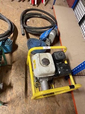 many hoses and a water pump on the floor