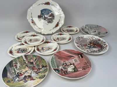 a lot of plates that are sitting on a table