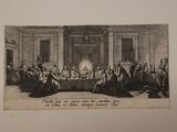 une vieille photo d'un groupe de personnes assises autour d'une table