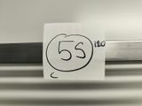 a sticker with the number 55 on it next to a knife