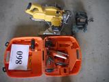 a small orange box with tools in it on the floor