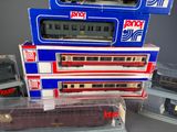 a stack of toy trains sitting on top of each other