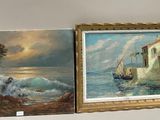 two paintings hanging on a wall next to each other