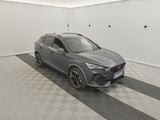 a grey suv parked in a garage with a checkered floor
