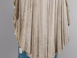 an image of a statue of a woman wearing a shawl