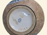 a picture of a ceramic bowl with a design on it