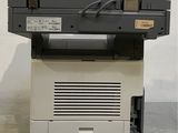 an image of a printer sitting on top of a desk
