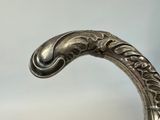 an image of a close up of a metal object on a table