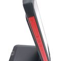 a cell phone that is sitting on a stand