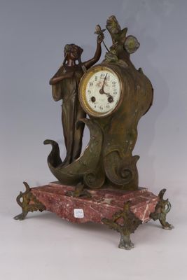 Epoque ART NOUVEAU Pendule en régule à patine verte et rehau…
