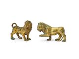 a pair of bronze lions on a white background