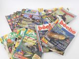 a lot of magazines that are on the table