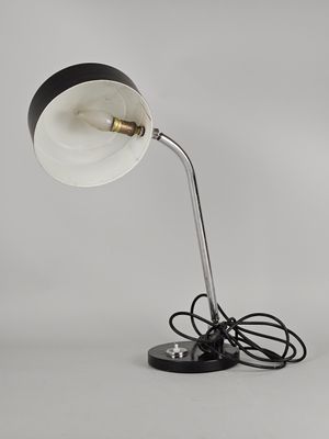 an image of a black and white lamp on a table