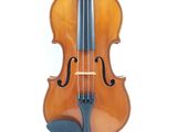 a violin that is sitting on a white surface