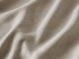 an image of a close up of a bed with a sheet on top of it