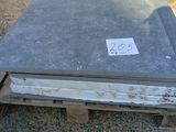 a pile of concrete blocks sitting on a pallet