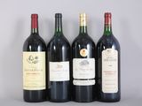 three bottles of red wine are lined up on a table