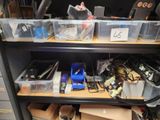 a shelf with many different types of electronics on it