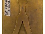 an image of a brass plaque with a man ' s torso on it