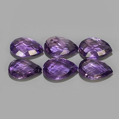 a set of six amethorate faceted pear shaped beads