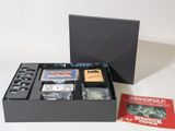 a black box with a game on it and a red box with a game on it