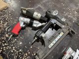 a couple of tools that are laying on the floor