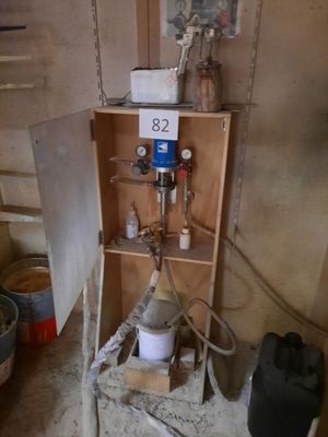 a picture of a room with a shelf and a water heater