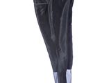 a black pants hanging on a clothes rack on a white wall