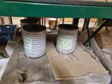 two cans that are sitting on a table