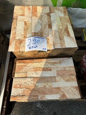 a stack of wooden pallets sitting on top of a pallet