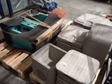 a pile of mattresses on a pallet in a warehouse