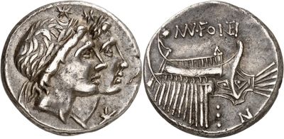 a silver coin with an image of a woman on it