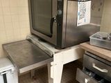 an image of a commercial kitchen with a microwave