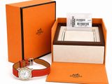 an image of a watch in a box with a barcode on it