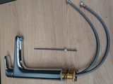 a picture of a hose and a wrenet on a table